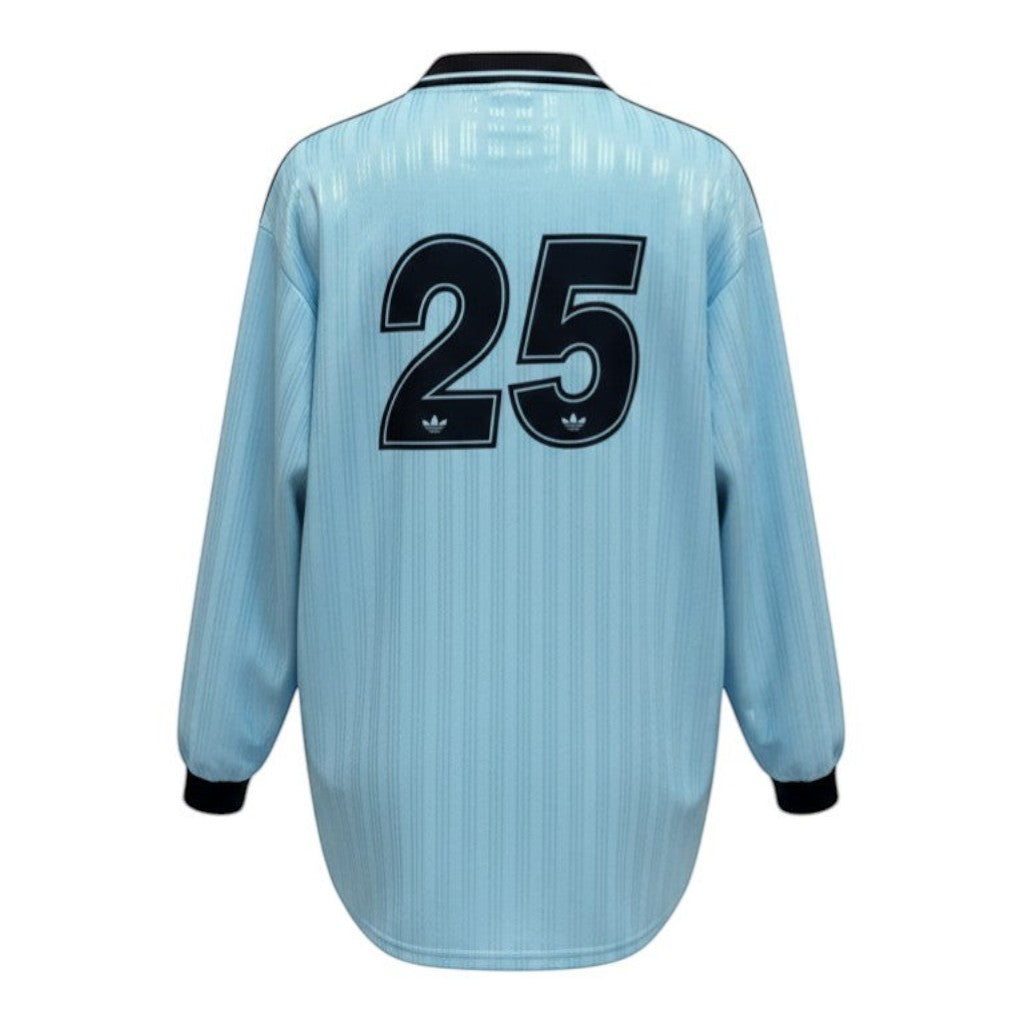 Hinchas Sportswear Store light blue Adidas x Oasis retro long sleeve jersey with number 25 on back, black collar and cuffs, and Adidas stripes.