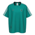 Hinchas Sportswear Store green retro Liverpool Adidas Originals jersey with white pinstripes, three stripes, and embroidered crest.