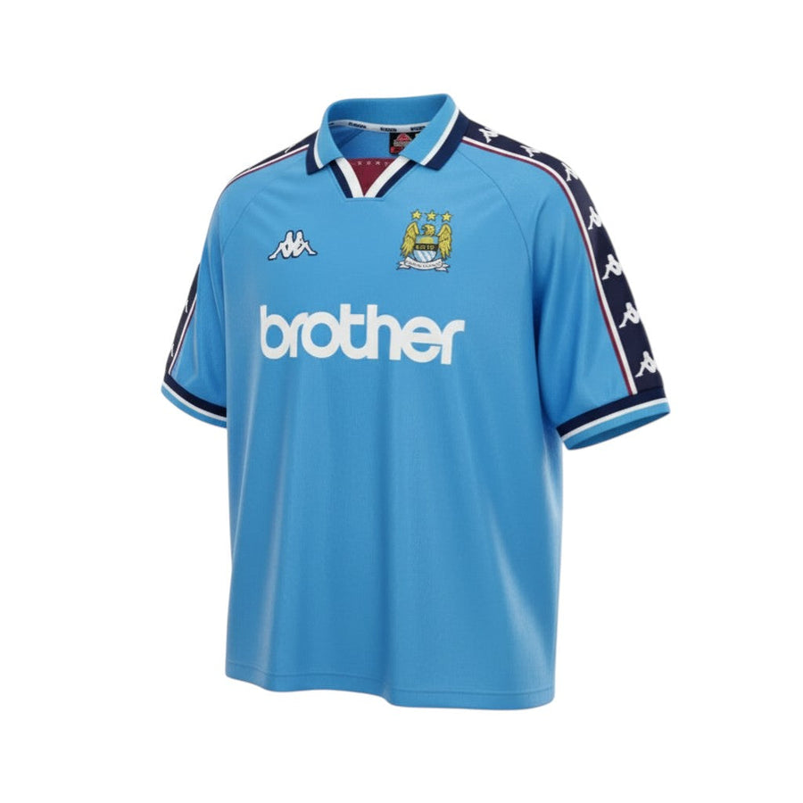 Hinchas Sportswear Store Manchester City 97-98 retro sky blue football jersey with Brother sponsor and Kappa logos.