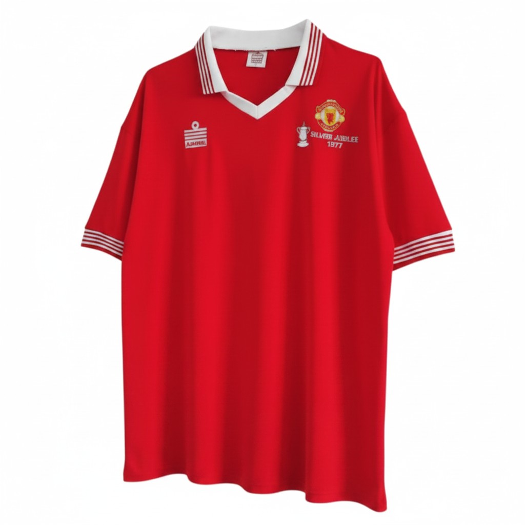 Hinchas Sportswear Store Manchester United 1977 FA Cup retro jersey in red with white V-neck collar and striped cuffs. Features commemorative Silver Jubilee badge.