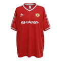 Hinchas Sportswear Store red Manchester United 1984-85 retro Adidas football jersey with Sharp sponsor and white stripes.
