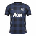 Hinchas Sportswear Store Manchester United 2013-14 navy blue away jersey with black tartan pattern, AON sponsor, and Nike Dri-FIT.
