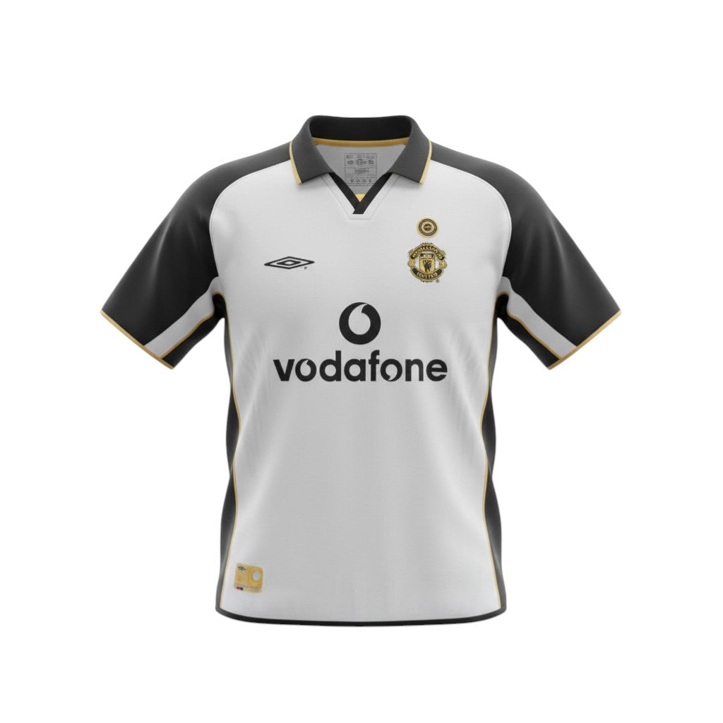 Hinchas Sportswear Store white Manchester United 2001-02 away jersey with black sleeves and gold trim. Features Vodafone sponsor and club crest.