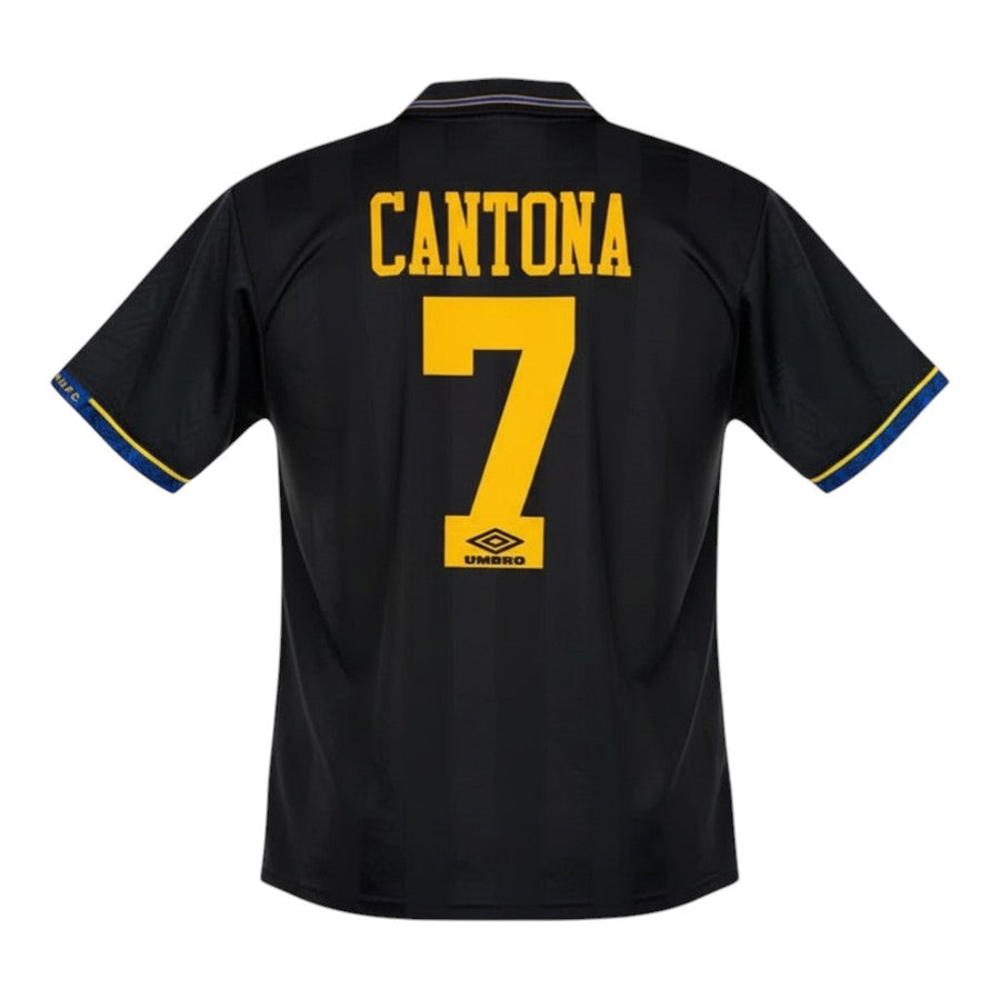 Hinchas Sportswear Store Manchester United 93-95 Cantona away jersey, black with yellow numbering and blue trim.
