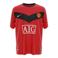 Hinchas Sportswear Store Manchester United 2009/10 retro red football jersey with black chevron, Nike logo, and AIG sponsor.