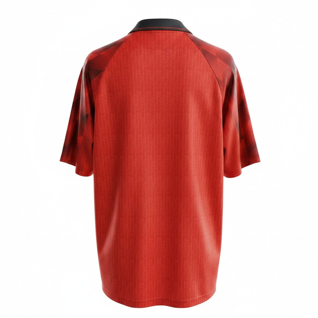Hinchas Sportswear Store Manchester United 1996/97 retro home jersey, red with tartan sleeves and white polo collar.