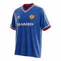 Hinchas Sportswear Store Manchester United 1986-87 royal blue Adidas third jersey with white Sharp sponsor, red and white trim.