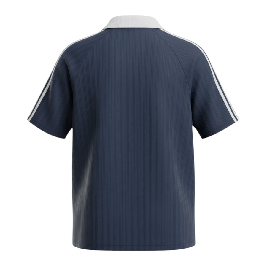 Hinchas Sportswear Store navy blue Adidas Originals retro jacquard polo tee with white collar and three stripes.