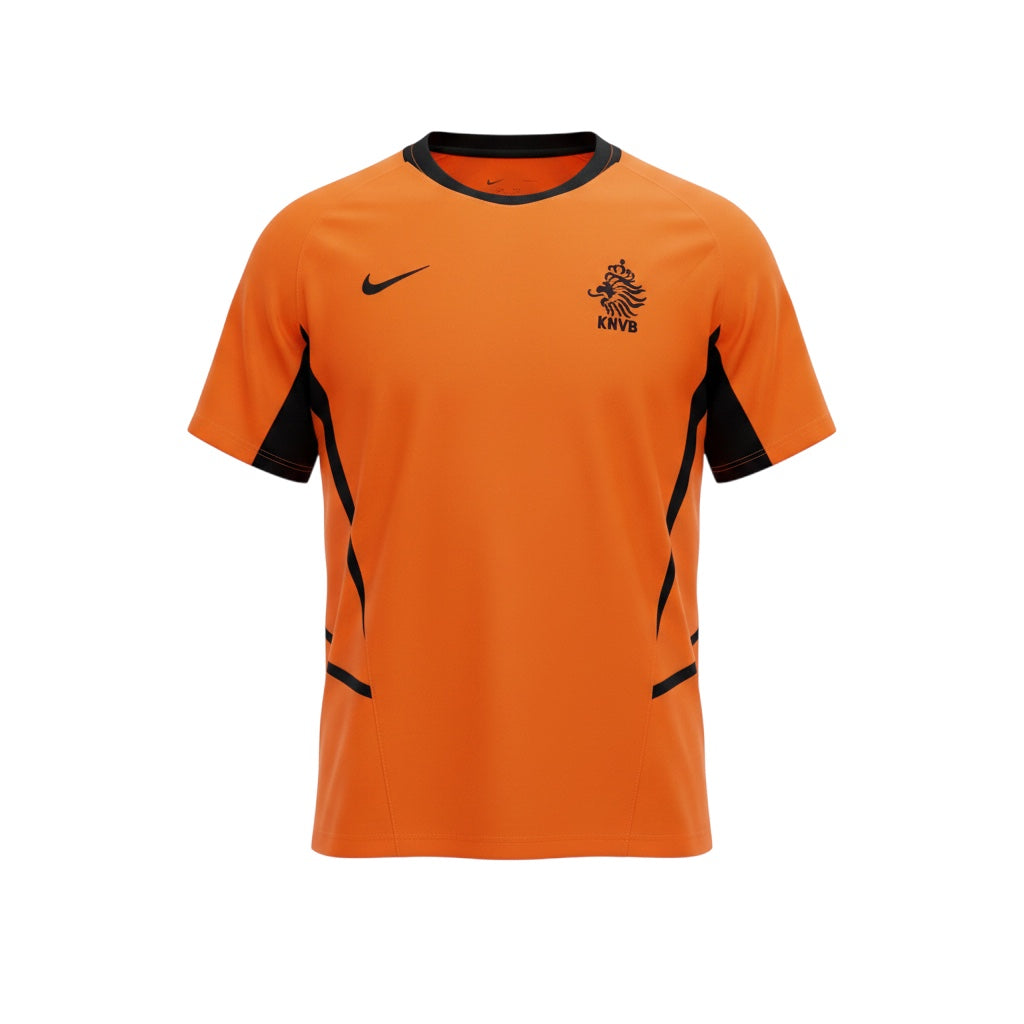 Hinchas Sportswear Store: Camiseta retro de local de Países Bajos 2002 Nike, naranja con paneles laterales negros en forma de flecha, cuello redondo y escudo KNVB bordado.