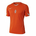 Hinchas Sportswear Store orange Nike Netherlands 2004 retro football jersey with white piping and KNVB crest.