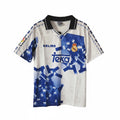 Hinchas Sportswear Store Real Madrid 1996-97 retro third jersey, white with blue geometric pattern, black collar, Kelme and Teka branding.