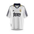 Hinchas Sportswear Store Real Madrid 1998-99 retro home jersey. White Adidas shirt with navy and yellow striped polo collar, Teka sponsor, and Centenary badge.