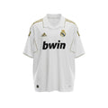 Hinchas Sportswear Store white Adidas Real Madrid 2011-12 retro jersey with gold trim and bwin sponsor.