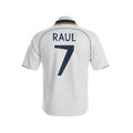 Hinchas Sportswear Store white retro Real Madrid jersey with navy blue trim and 'RAUL 7' on the back.