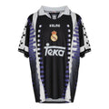 Hinchas Sportswear Store Real Madrid 1996-97 retro away jersey, black with white and purple geometric patterns, Kelme and Teka logos.