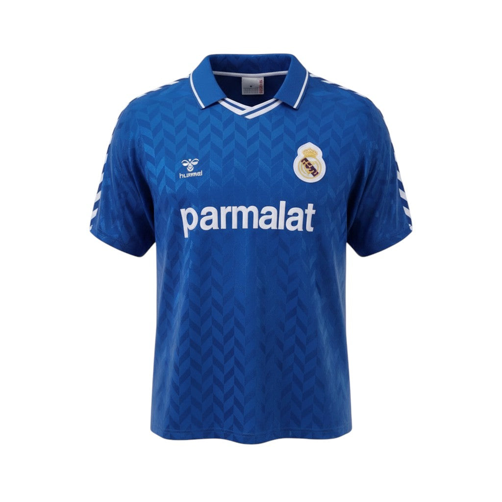 Hinchas Sportswear Store Real Madrid 1989-92 retro royal blue Hummel away jersey with Parmalat sponsor and white chevron details.