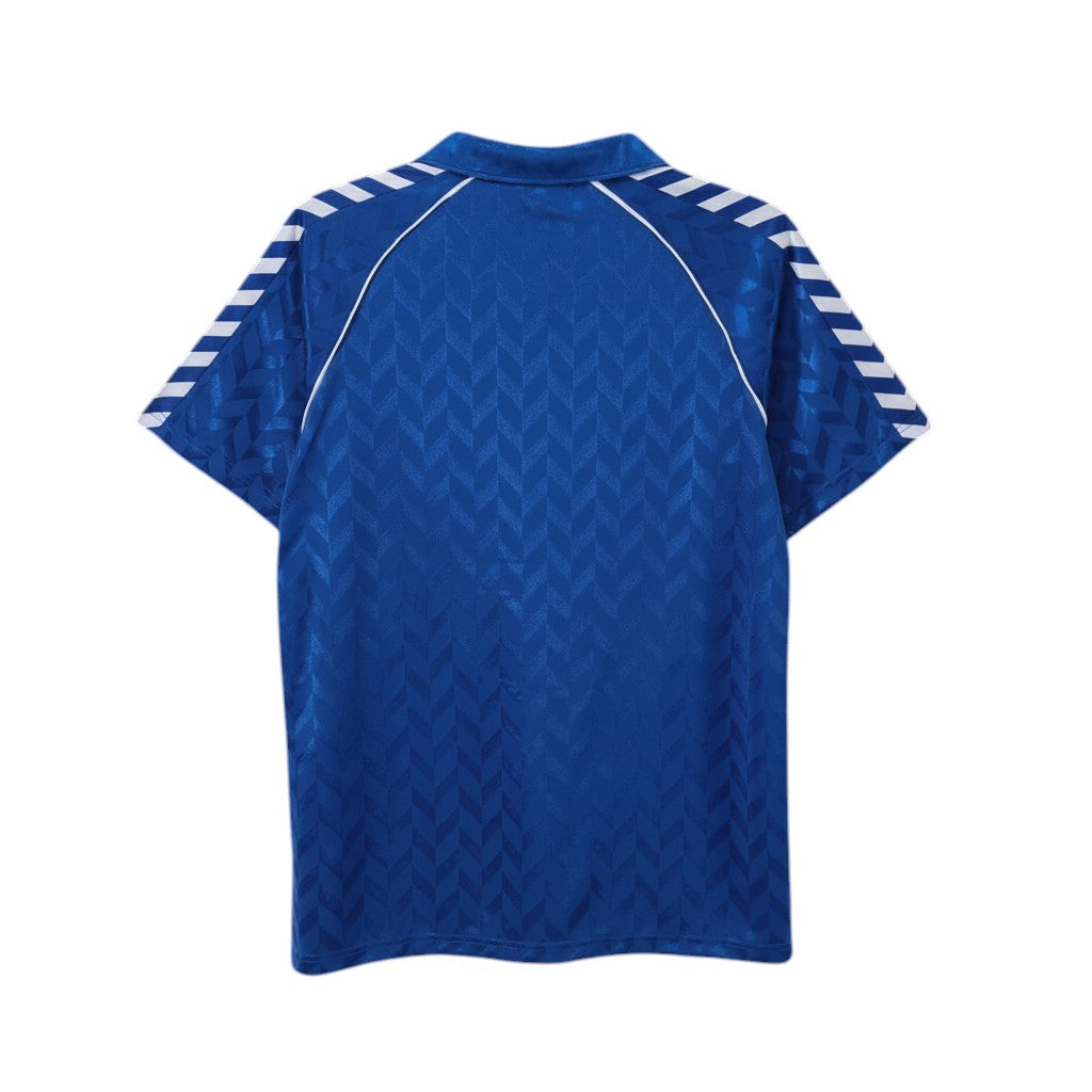 Hinchas Sportswear Store Real Madrid 1989-92 retro royal blue Hummel away jersey with white chevron sleeves.
