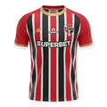 Hinchas Sportswear Store São Paulo FC 2024/25 away jersey with red, black, and white vertical stripes, gold trim, and embroidered crest.