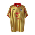 Hinchas Sportswear Store SL Benfica 98/99 retro away jersey, gold metallic with red Adidas stripes and collar, Telecel sponsor.