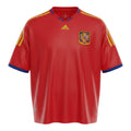 Hinchas Sportswear Store red 2010 Spain World Cup Adidas jersey with yellow stripes and blue trim, featuring the RFEF crest and FIFA patch.
