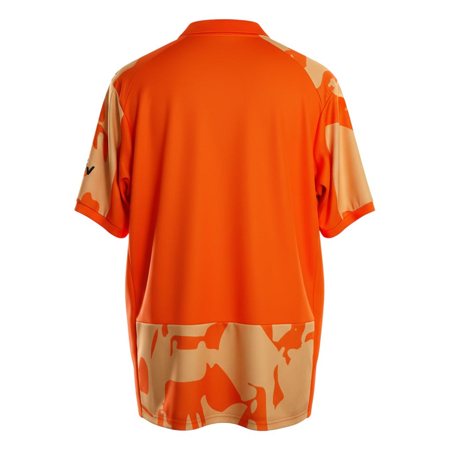 Hinchas Sportswear Store Valencia CF 2025/26 retro away jersey in orange with cream camouflage pattern and polo collar.